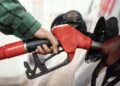 Man filling up car with petrol