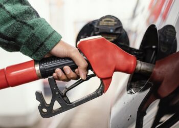 Man filling up car with petrol