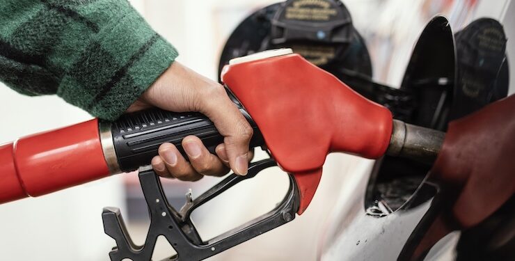Man filling up car with petrol